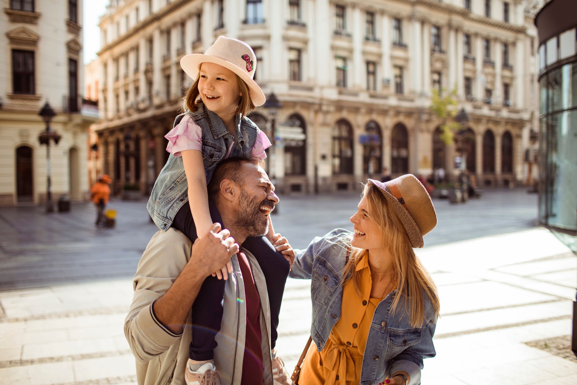 Young caucasian family shopping in the city